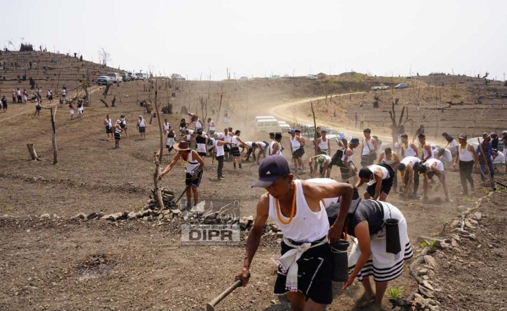 Participants from Chiechama Village during the traditional rice sowing programme held at Chiethu, Kohima on April 5. (DIPR Photo)